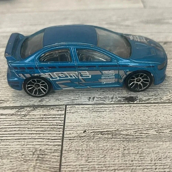 Hot Wheels 2008 Lancer Evolution Blue Nightburnerz '10 C 17 - Picture 1 of 9